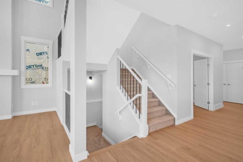 239 Chelsea  Park, Chestermere, AB - Indoor Photo Showing Other Room