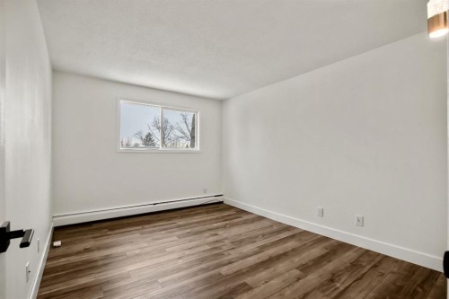 5-2319 19 Street, Nanton, AB - Indoor Photo Showing Other Room