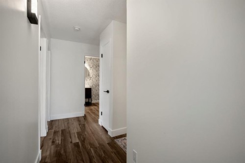 5-2319 19 Street, Nanton, AB - Indoor Photo Showing Other Room