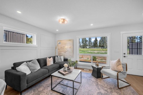 604 Clover Road, Carstairs, AB - Indoor Photo Showing Living Room
