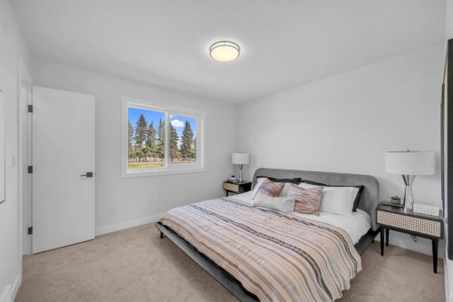 604 Clover Road, Carstairs, AB - Indoor Photo Showing Bedroom