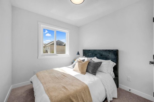 604 Clover Road, Carstairs, AB - Indoor Photo Showing Bedroom