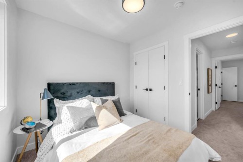 604 Clover Road, Carstairs, AB - Indoor Photo Showing Bedroom