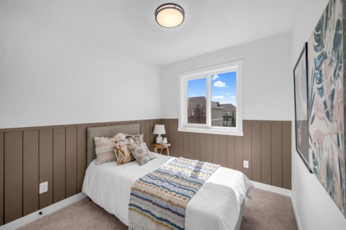 604 Clover Road, Carstairs, AB - Indoor Photo Showing Bedroom