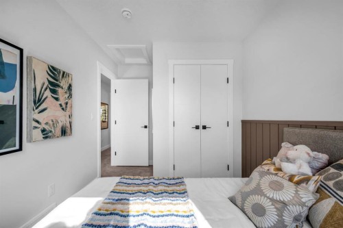 604 Clover Road, Carstairs, AB - Indoor Photo Showing Bedroom