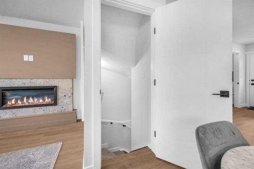 604 Clover Road, Carstairs, AB - Indoor With Fireplace