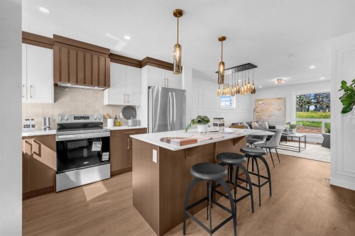 604 Clover Road, Carstairs, AB - Indoor Photo Showing Kitchen With Stainless Steel Kitchen With Upgraded Kitchen