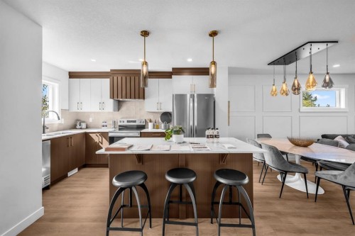 604 Clover Road, Carstairs, AB - Indoor Photo Showing Kitchen With Stainless Steel Kitchen With Upgraded Kitchen