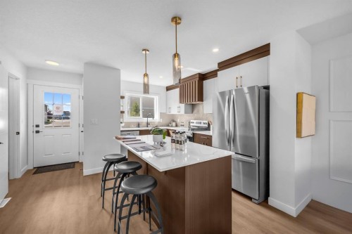 604 Clover Road, Carstairs, AB - Indoor Photo Showing Kitchen With Stainless Steel Kitchen With Upgraded Kitchen