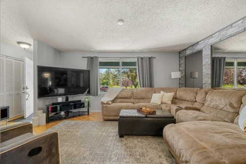 159 Rundlehorn Crescent Ne, Calgary, AB - Indoor Photo Showing Living Room