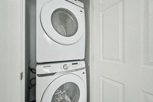 2040 Carrington Boulevard Nw, Calgary, AB - Indoor Photo Showing Laundry Room