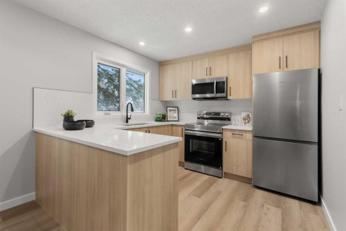 7512 Hunterfield Road Nw, Calgary, AB - Indoor Photo Showing Kitchen