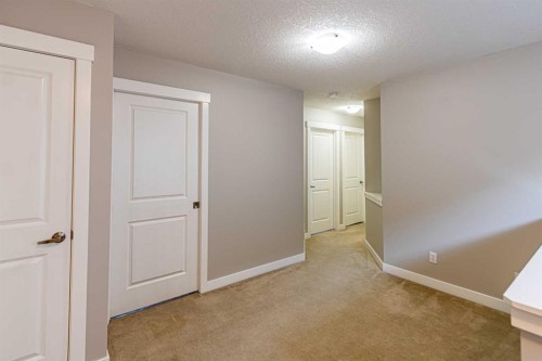 173 Silverado Plains Close Sw, Calgary, AB - Indoor Photo Showing Other Room