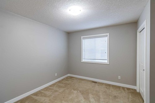 173 Silverado Plains Close Sw, Calgary, AB - Indoor Photo Showing Other Room