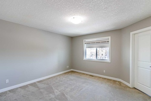 173 Silverado Plains Close Sw, Calgary, AB - Indoor Photo Showing Other Room