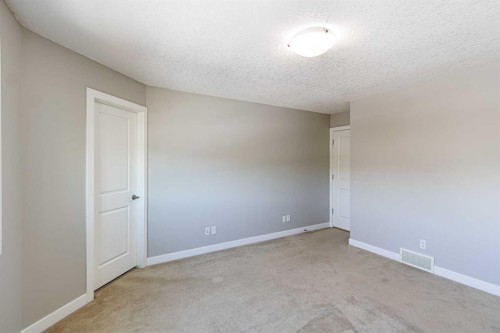 173 Silverado Plains Close Sw, Calgary, AB - Indoor Photo Showing Other Room