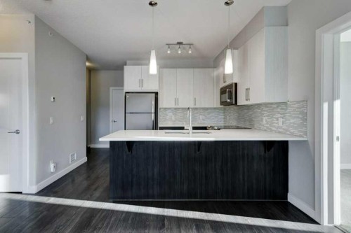 321-16 Sage Hill Terrace Nw, Calgary, AB - Indoor Photo Showing Kitchen With Upgraded Kitchen