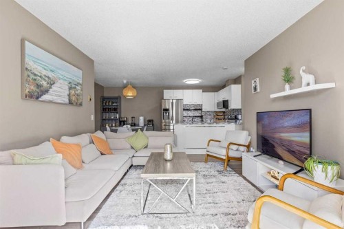 11-2611 Edenwold Heights Nw, Calgary, AB - Indoor Photo Showing Living Room