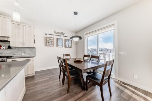 69 Sundown Grove, Cochrane, AB - Indoor Photo Showing Dining Room