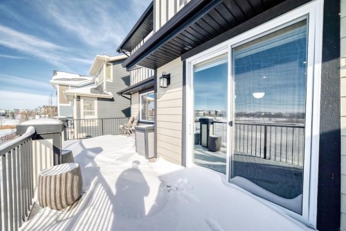 69 Sundown Grove, Cochrane, AB - Outdoor With Deck Patio Veranda With Exterior