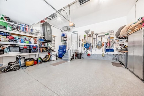 69 Sundown Grove, Cochrane, AB - Indoor Photo Showing Garage