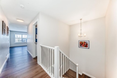 69 Sundown Grove, Cochrane, AB - Indoor Photo Showing Other Room
