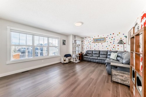 69 Sundown Grove, Cochrane, AB - Indoor Photo Showing Living Room