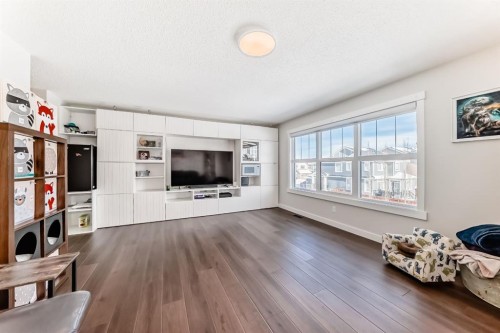 69 Sundown Grove, Cochrane, AB - Indoor Photo Showing Living Room