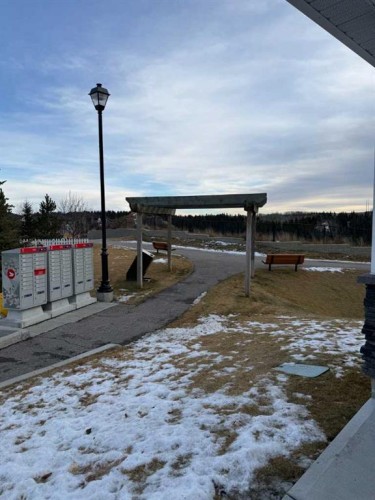 2103 Jumping Pound Common, Cochrane, AB - Outdoor With Body Of Water With View