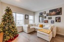 2103 Jumping Pound Common, Cochrane, AB  - Indoor Photo Showing Living Room 