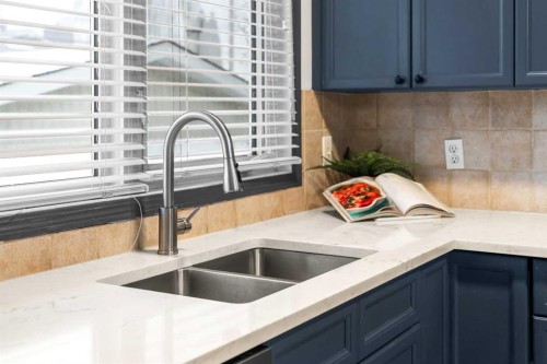 13127 Lake Crimson Drive Se, Calgary, AB - Indoor Photo Showing Kitchen With Double Sink