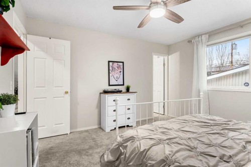 13127 Lake Crimson Drive Se, Calgary, AB - Indoor Photo Showing Bedroom