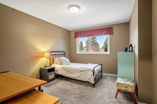 13127 Lake Crimson Drive Se, Calgary, AB - Indoor Photo Showing Bedroom