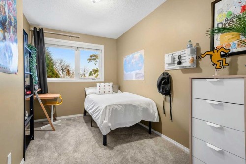 13127 Lake Crimson Drive Se, Calgary, AB - Indoor Photo Showing Bedroom