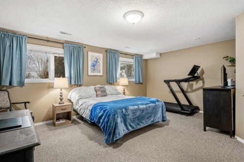 13127 Lake Crimson Drive Se, Calgary, AB - Indoor Photo Showing Bedroom