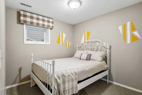 13127 Lake Crimson Drive Se, Calgary, AB - Indoor Photo Showing Bedroom