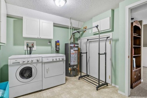 13127 Lake Crimson Drive Se, Calgary, AB - Indoor Photo Showing Laundry Room