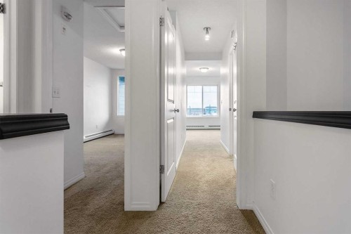 16-21 Mckenzie Towne Gate Se, Calgary, AB - Indoor Photo Showing Other Room