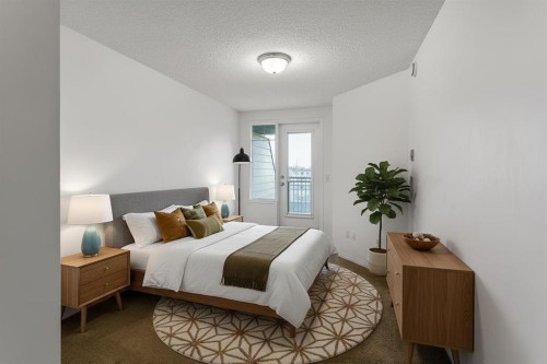 16-21 Mckenzie Towne Gate Se, Calgary, AB - Indoor Photo Showing Bedroom