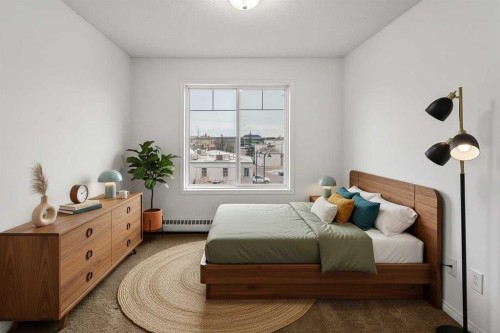 16-21 Mckenzie Towne Gate Se, Calgary, AB - Indoor Photo Showing Bedroom