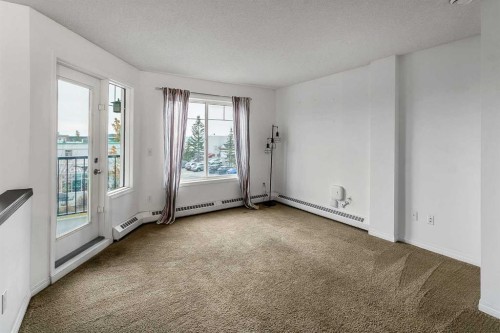16-21 Mckenzie Towne Gate Se, Calgary, AB - Indoor Photo Showing Other Room