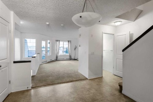 16-21 Mckenzie Towne Gate Se, Calgary, AB - Indoor Photo Showing Other Room