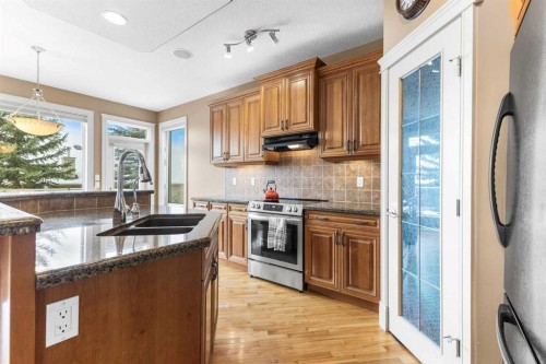 131 Discovery Ridge Way Sw, Calgary, AB - Indoor Photo Showing Kitchen With Double Sink