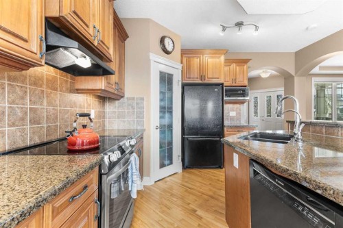 131 Discovery Ridge Way Sw, Calgary, AB - Indoor Photo Showing Kitchen With Double Sink With Upgraded Kitchen