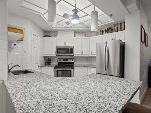 105-820 15 Avenue Sw, Calgary, AB - Indoor Photo Showing Kitchen With Stainless Steel Kitchen With Upgraded Kitchen