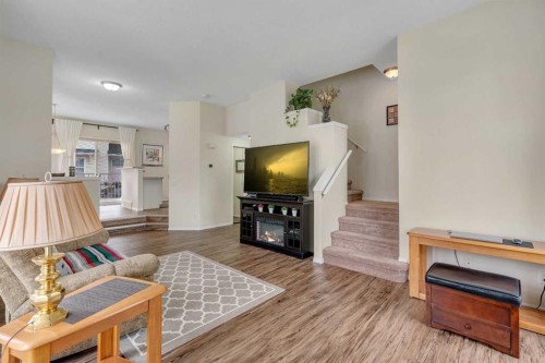 117 Mckenzie Towne Gate Se, Calgary, AB - Indoor Photo Showing Living Room