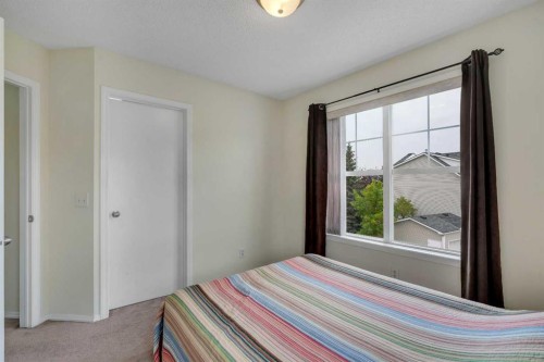 117 Mckenzie Towne Gate Se, Calgary, AB - Indoor Photo Showing Bedroom