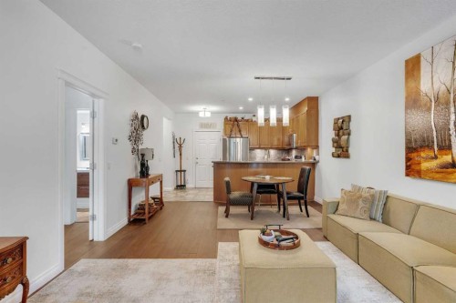 101-8 Hemlock Crescent Sw, Calgary, AB - Indoor Photo Showing Living Room