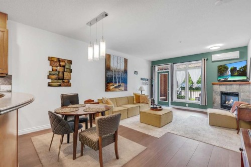 101-8 Hemlock Crescent Sw, Calgary, AB - Indoor With Fireplace