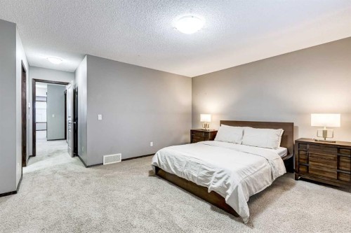 9 Cranwell Court Se, Calgary, AB - Indoor Photo Showing Bedroom